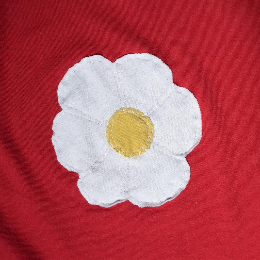 Dancing in a field of flowers tee